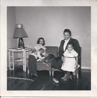 (Far right) Rasheedah Ali-Seck and a young Aissatou, joined by family friends, mid-1950s